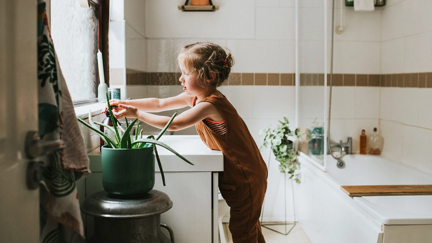 little girl washing hands